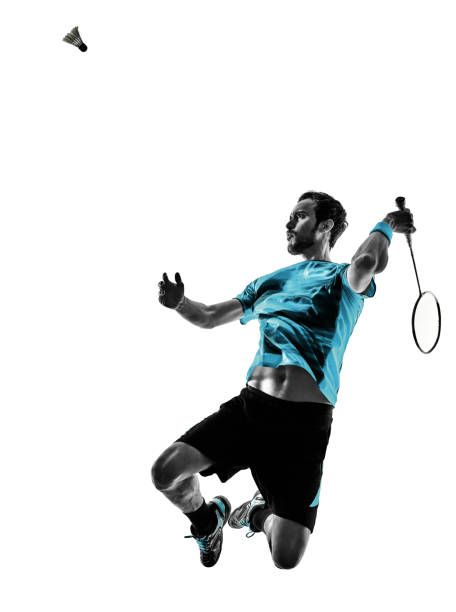 istock Badminton player man shadow silhouette isolated white background 1199132278