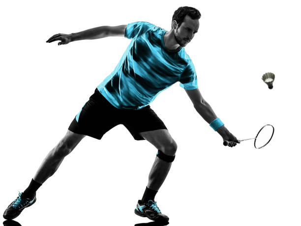 istock Badminton player man shadow silhouette isolated white background 1199132307