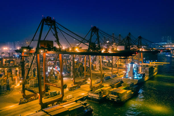 istock Container Dock in the harbor at night 1199138127