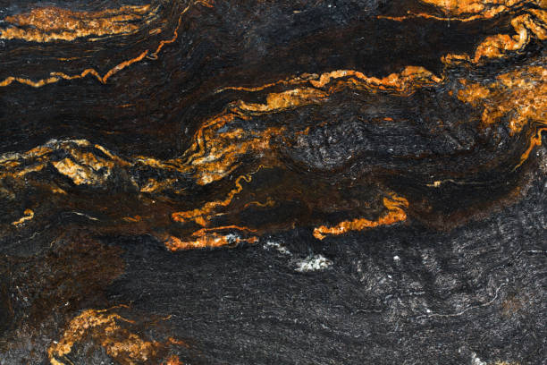 istock Orange, black natural marble stone background. High quality texture in extremely high resolution. 1199149876