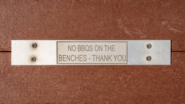 istock Sign: No BBQs on the benches - thank you 1199151483