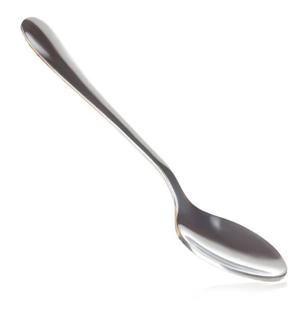 istock Spoon close-up isolated on a white background. 1199154370