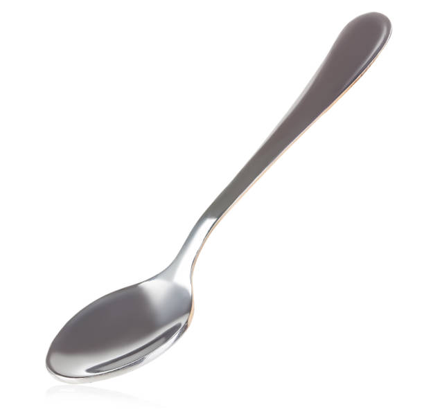istock Spoon close-up isolated on a white background. 1199154376