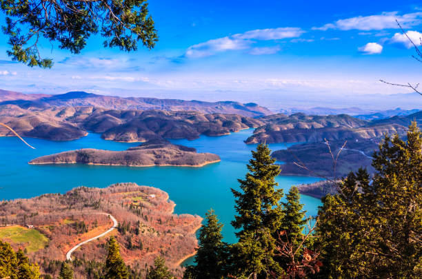 idyllic landscape on the lake of plastiras in central greece. - central greece imagens e fotografias de stock