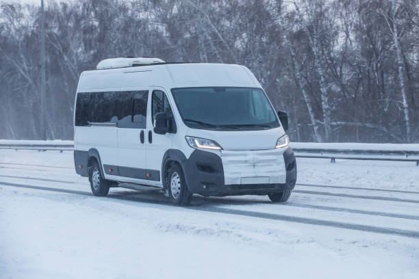 istock Minibus moves in the winter on a highway 1199161213