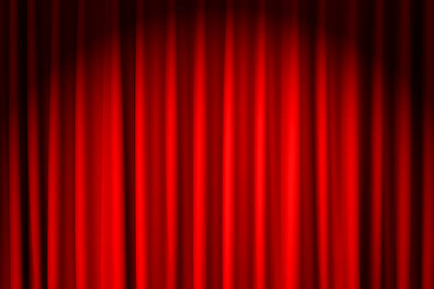 istock closed red velvet curtain - use for background 1199161377