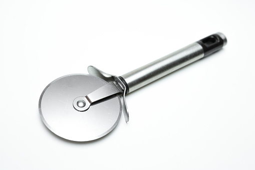 Pizza cutter on white background
