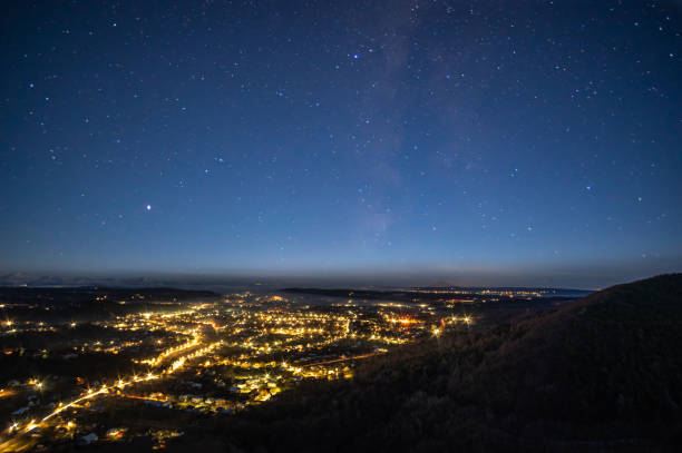 istock Starry sky over the night city 1199164235