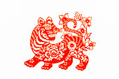 Chinese traditional paper cutting, Zodiac signs. Chinese New Year, Year of the Tiger. Chinese animal Yuehu traditional paper-cut art pattern. Tiger paper cut, Chinese New Year.