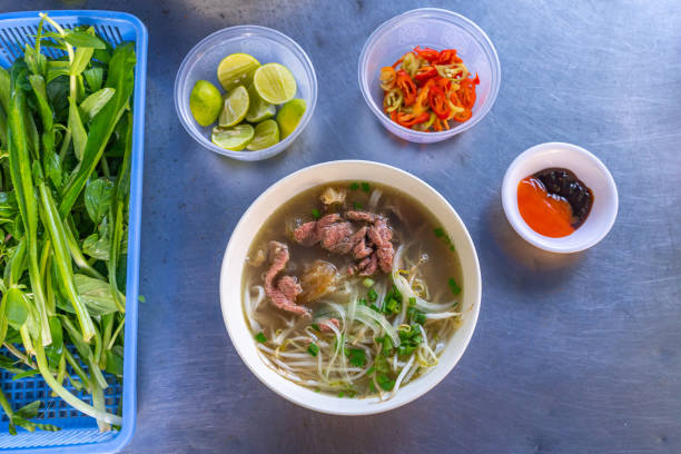 istock Vietnamese famous dish, Pho beef noodle soup and vegetables 1199164491