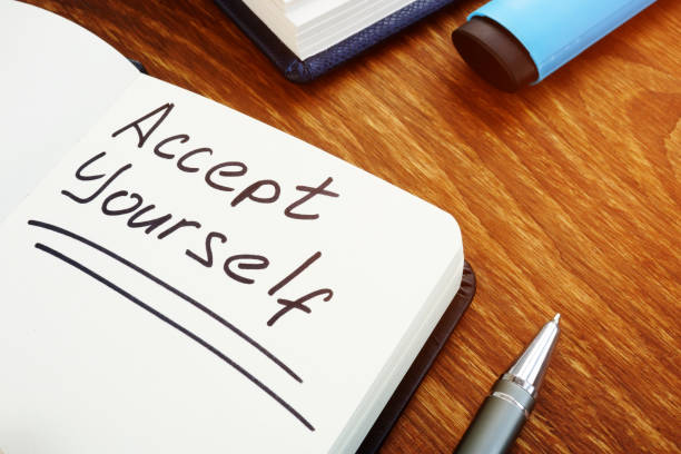 istock Accept yourself motivation sign in the black notebook. 1199165206