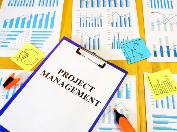 istock Project management plan and business report on the desk. 1199165303