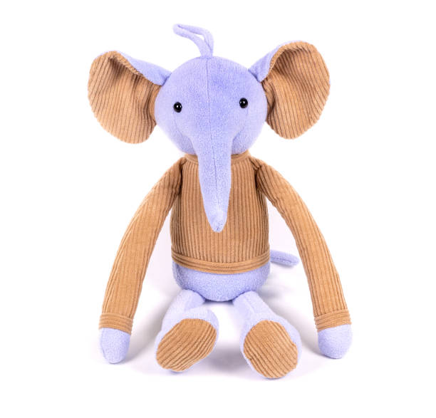 istock soft toy white background isolated blue elephant in a brown sweater 1199166703