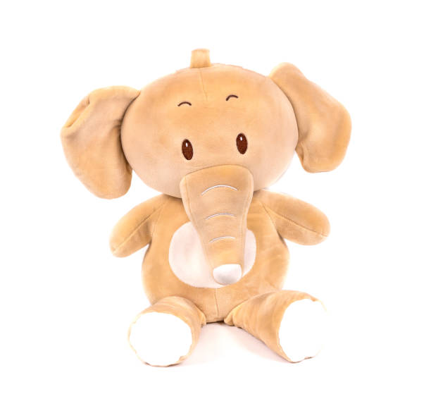 istock soft toy white background isolated brown elephant 1199166715