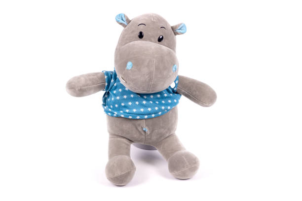 istock soft toy white background isolated gray hippo in a blue jacket 1199166717
