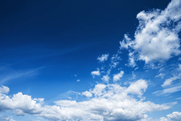 istock White clouds in the blue sky. Universal background. 1199168688