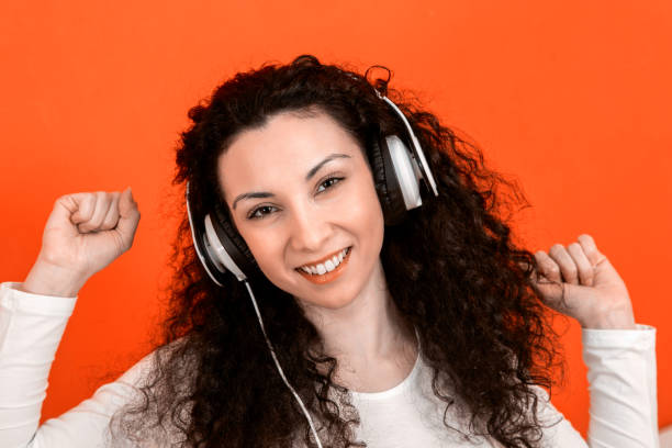 istock Young woman with white headset 1199169653