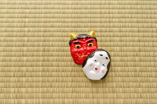 Photo of Japanese traditional event Setsubun. Scatter parched beans to drive out bad luck and call in good luck (on the last day of winter according to the lunar calendar)
