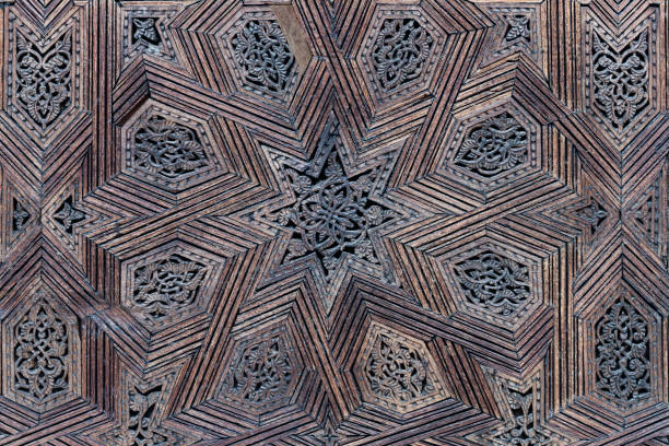 Wood carvings of a traditional islamic geometric design, Fes, Morocco. stock photo