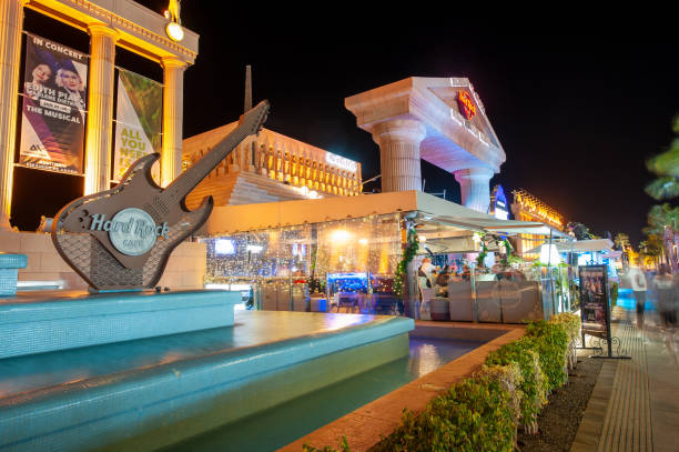 LOS CRISTIANOS - TENERIFE, SPAIN - DEC 29, 2019: Hard Rock cafe at the Boulevard Avenida de las Americas in the popular city Los Cristianos on the canarian island of Tenerife.
