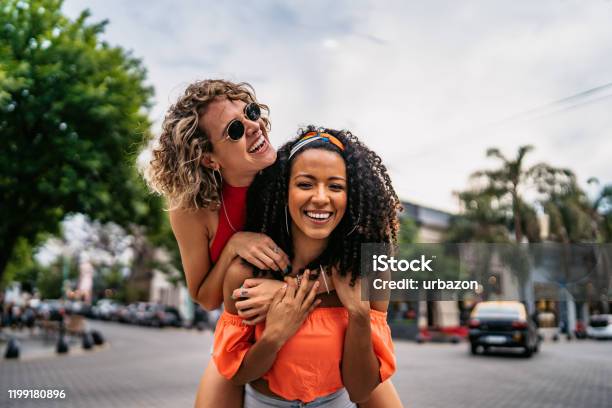 Two Beautiful Women Having Fun Stock Photo - Download Image Now - Friendship, Happiness, Women