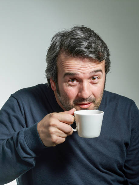 istock Happy mature man drinking coffee 1199181283
