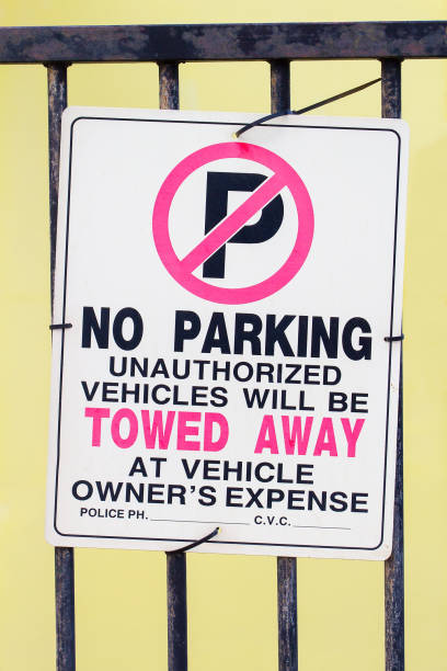 istock No parking traffic sign on metal gate 1199188402