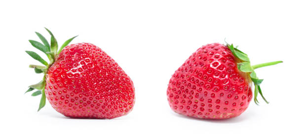istock strawberry isolated over white. fresh strawberry 1199192688