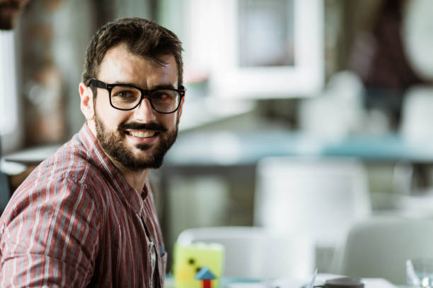 istock Happy creative man in the office. 1199193551