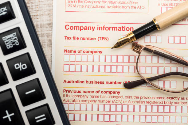 istock Australian tax declaration and pen on wooden table 1199194095