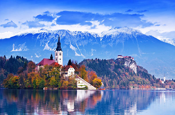 Bled lake, island Bled with lake, island, castle and mountains in background, Slovenia, Europe julian alps stock pictures, royalty-free photos & images