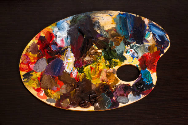 istock Artist's palette with oil paints, abstract background 1199195104