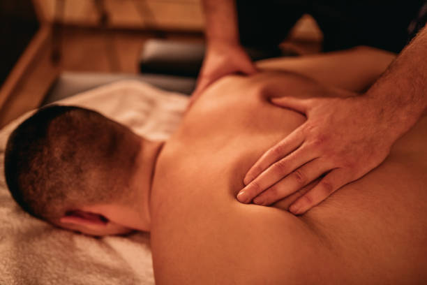 istock Young Man Enjoying Massage 1199195221