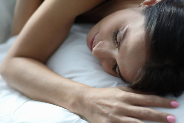 istock Sleeping female in morning 1199195516