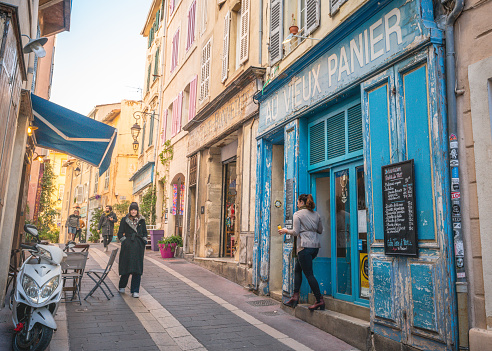 Marseille France, 27 December 2019 : Rue du Panier or The Panier street old Town area of Marseille with restaurant and shops in France