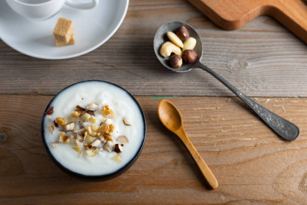 istock Healthy breakfast yogurt with fruit and nuts. 1199200588