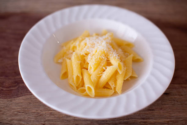 Penne pasta with butter and parmesan cheese