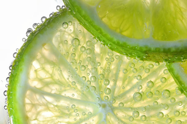 istock Lemon Slices In Water With Air Bubbles 1199204889