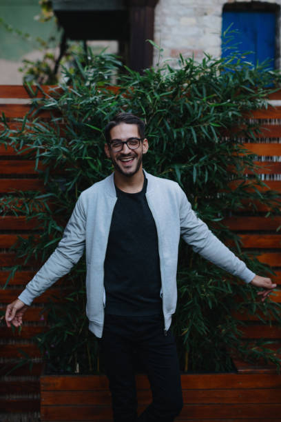 istock Portrait of a smiling young man 1199210973