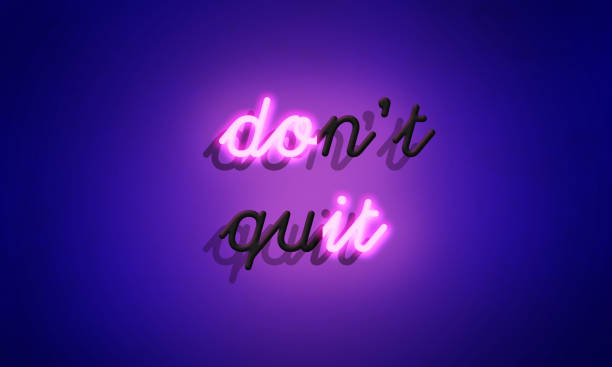 Pink Neon sign 'Don't quit' stock photo