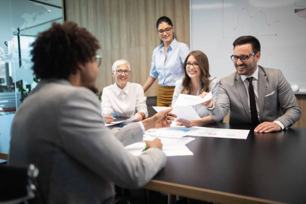 istock Successful group of business people at work in office 1199214576