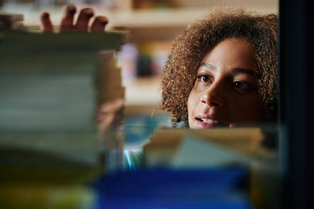 istock Excited Girl In Book Store 1199214657