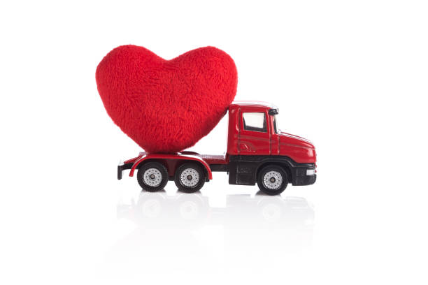 istock Toy truck with heart 1199218002