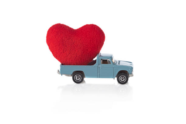 istock Toy car with heart 1199218138