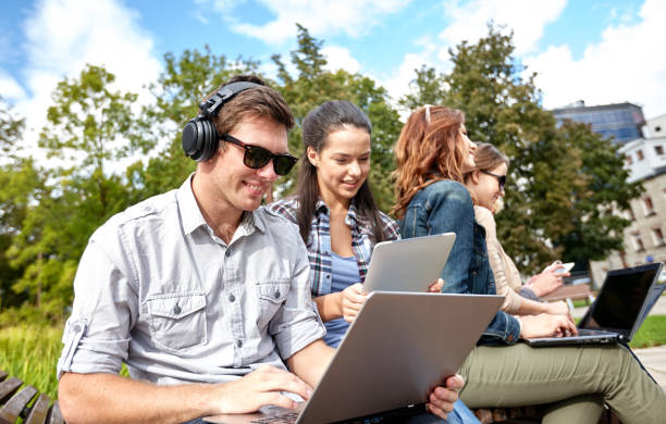 istock students or teenagers with laptop computers 1199218224