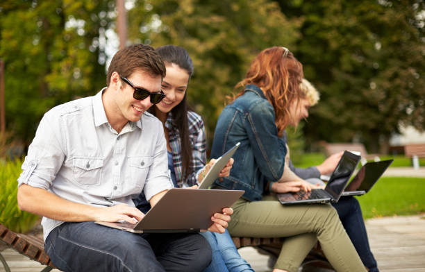 istock students or teenagers with laptop computers 1199218524