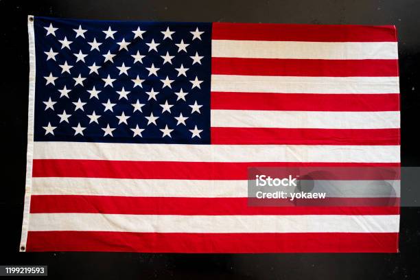 Usa Flag On Black Concrete Background Flatlay Stock Photo - Download Image Now - American Flag, Textile, Blue