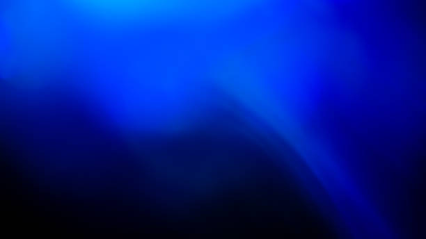 istock blue flare on a black background. beautiful light for design 1199219597