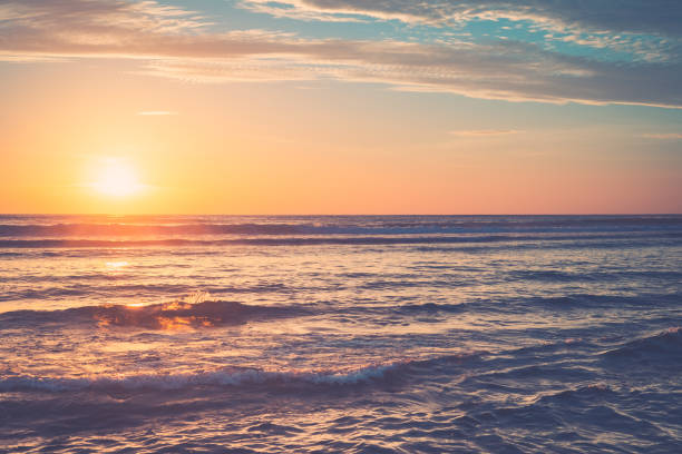 istock Tropical beach with smooth wave and sunset sky abstract background. Copy space of business summer vacation and travel adventure concept. 1199220919