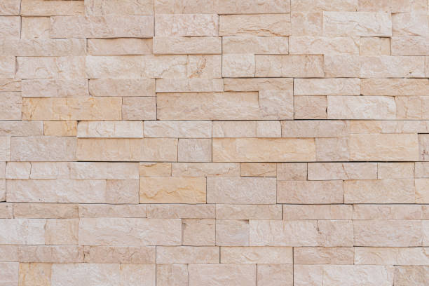 istock Old grunge brown stone brick wall texture abstract background. 1199220935